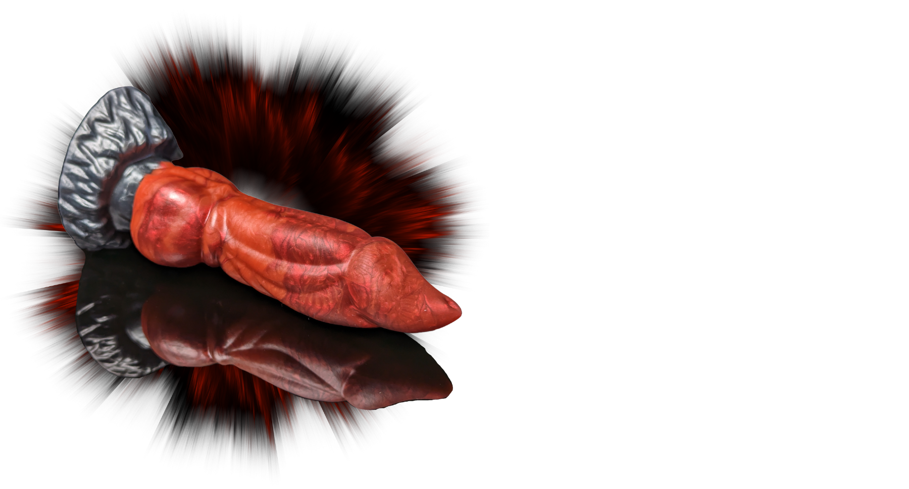 Split color Uldred dragon dildo on a reflective surface with an abstract spikey black and red background.