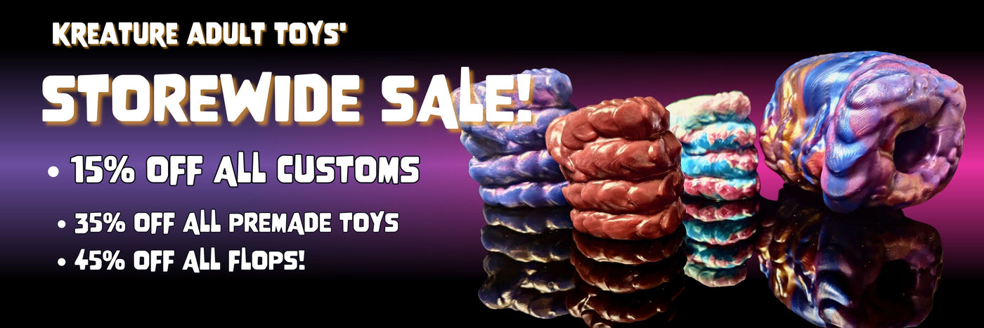 monthly sale details. 15% off customs, 35% off premade toys, 45% off flops. Next to arrangement of dragon fist masturbators
